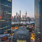 Financial center between two tall office buildings from a high viewpoint_11zon